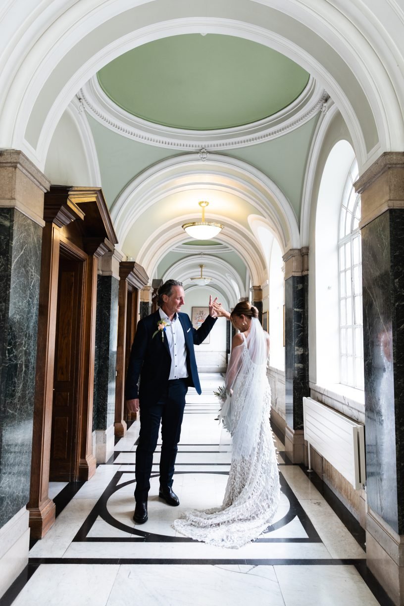 Islington town hall and the Hackney Wedding Photographer London: bride groom portraits hallway