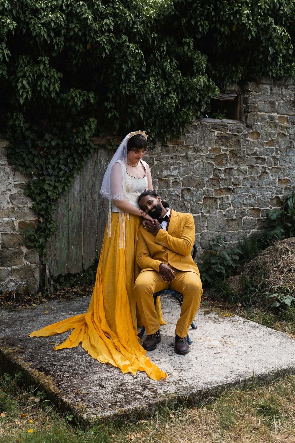 Photography of a yellow DIY wedding in a barn by London photographer Lauren Squire