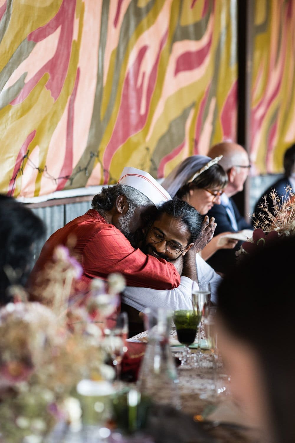 Photography of a yellow DIY wedding in a barn by London photographer Lauren Squire