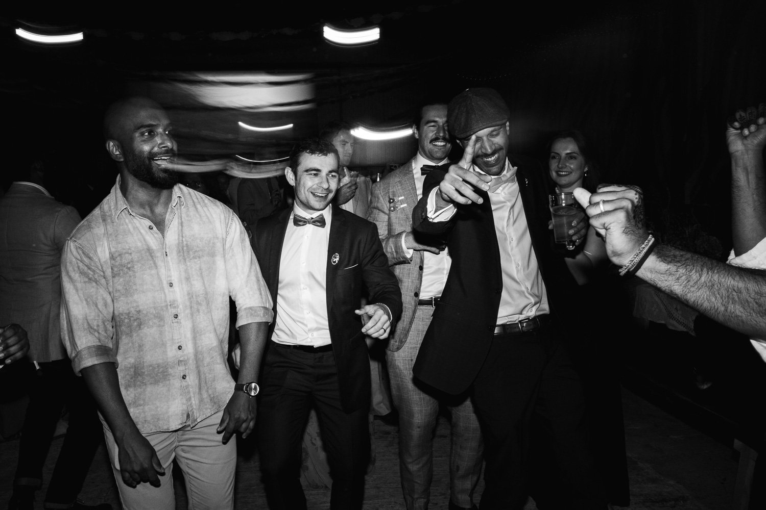 Photography of a yellow DIY wedding in a barn by London photographer Lauren Squire